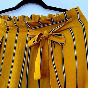 Gold Black and White stripe pants. Size Large.